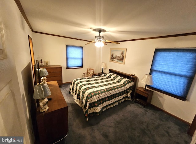 carpeted bedroom featuring ceiling fan and ornamental molding