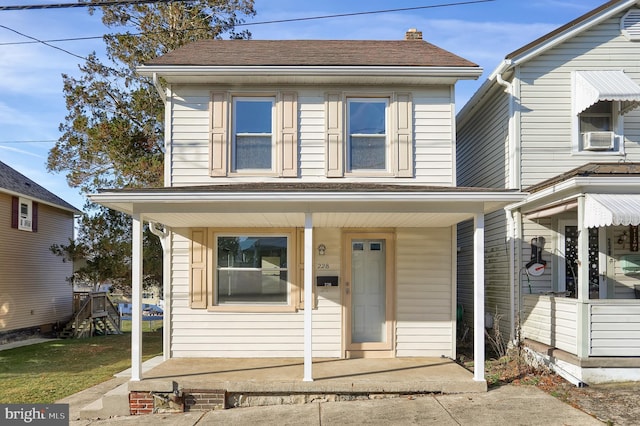 view of front of property featuring cooling unit