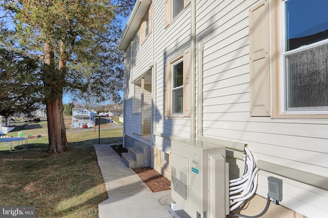 view of home's exterior with ac unit