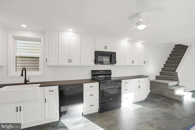 kitchen featuring black appliances, ceiling fan, white cabinets, and sink