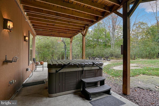 view of patio with a hot tub