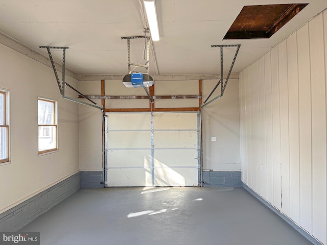 garage featuring a garage door opener