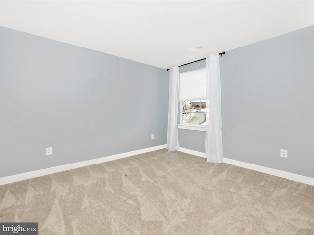 view of carpeted spare room