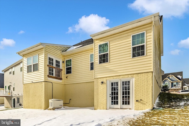 view of snow covered property