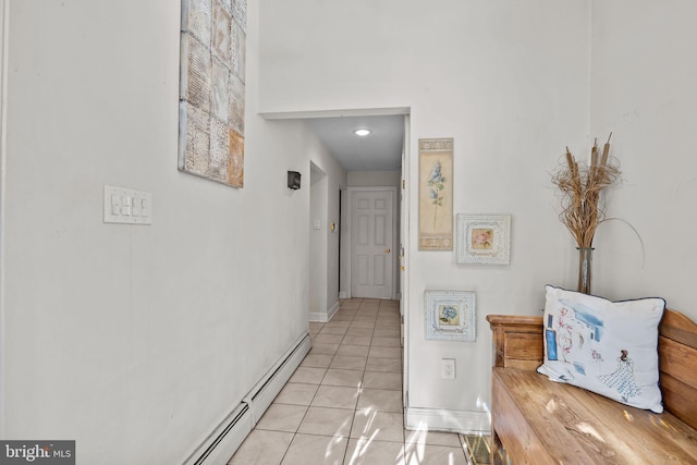 corridor with light tile patterned floors