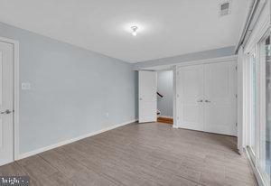 unfurnished bedroom featuring light hardwood / wood-style flooring