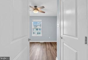 interior space featuring ceiling fan and hardwood / wood-style floors