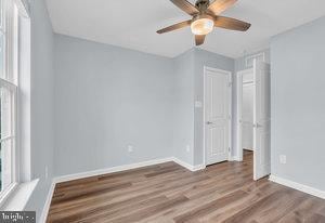 empty room featuring hardwood / wood-style flooring