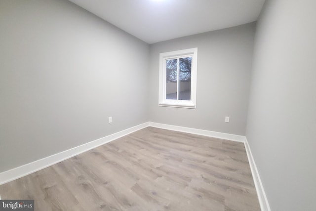 unfurnished room featuring light hardwood / wood-style flooring