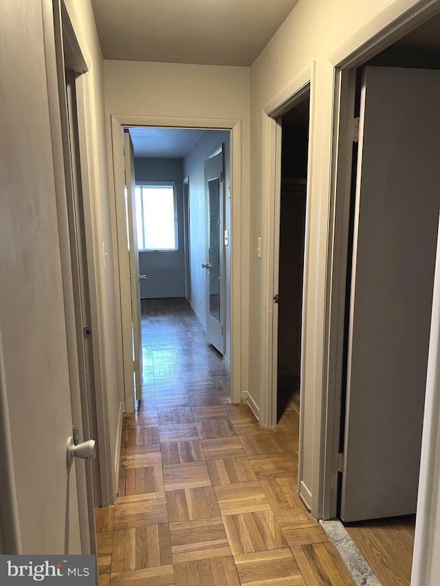 hallway with parquet floors