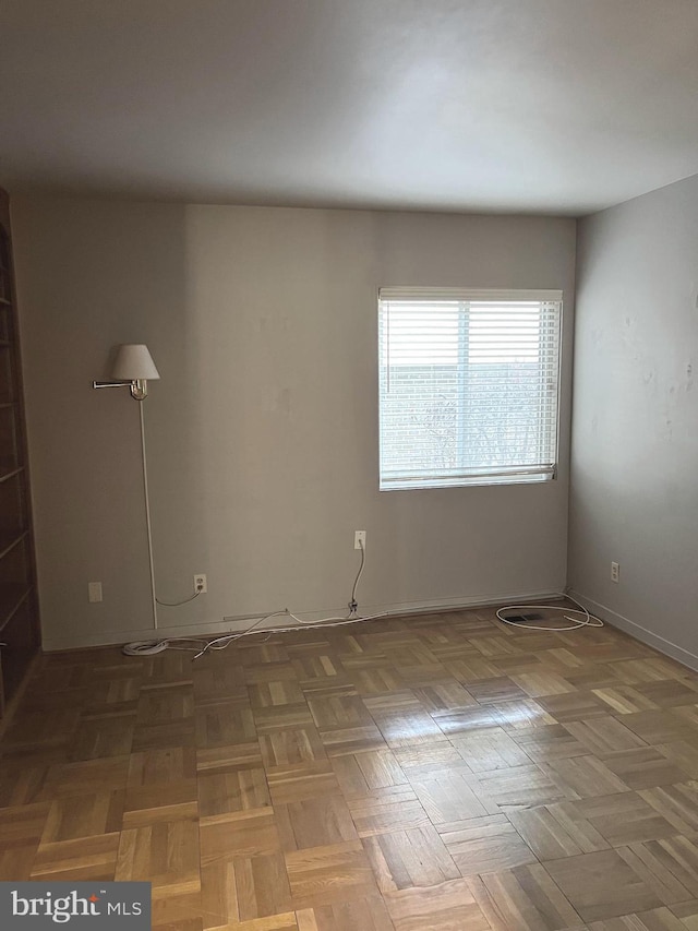 empty room with parquet floors