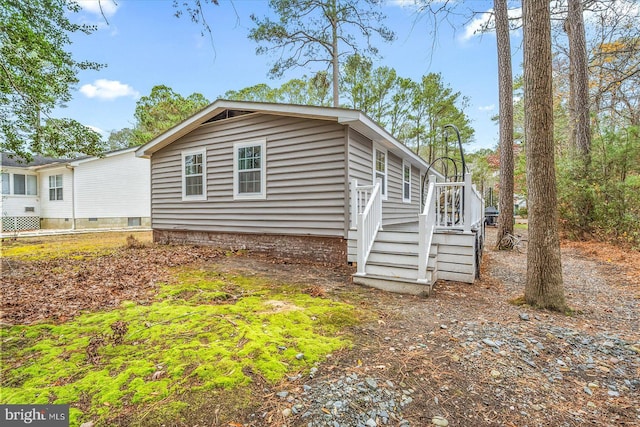 exterior space with a wooden deck