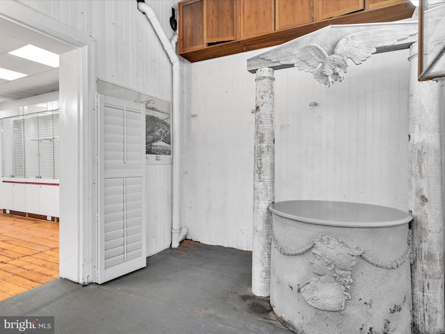 bathroom with concrete flooring