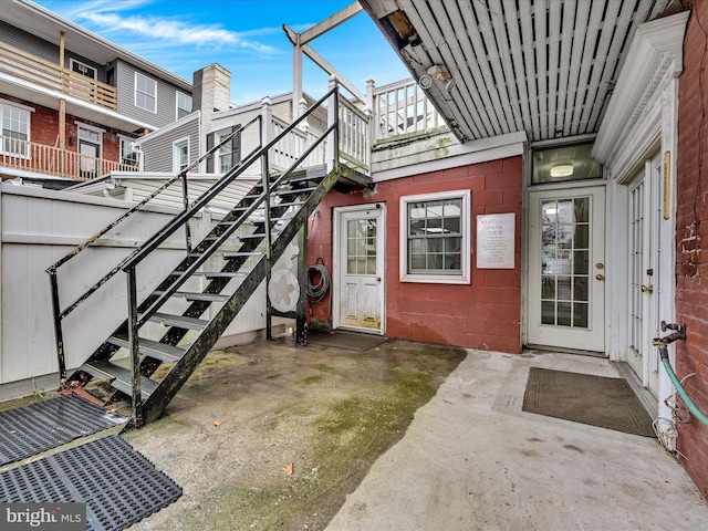 property entrance with a patio area