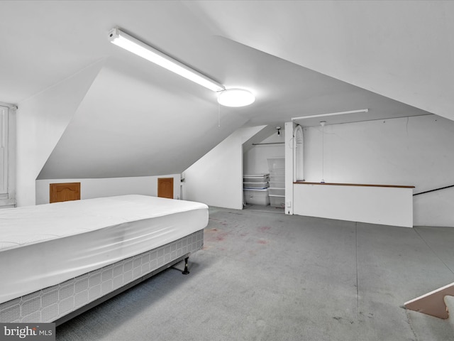 bedroom featuring vaulted ceiling