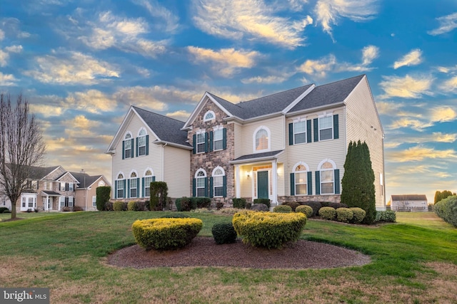 view of front of home featuring a yard