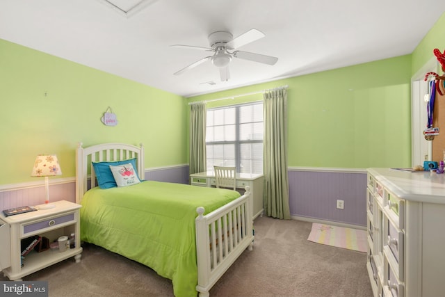 bedroom with ceiling fan and carpet floors