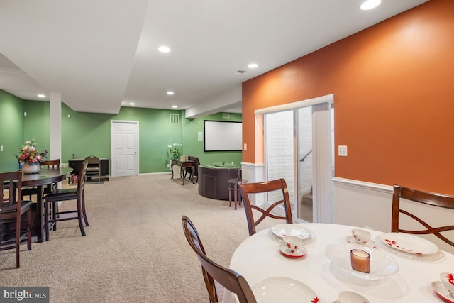 view of carpeted dining area