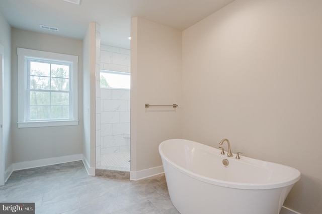 bathroom with independent shower and bath