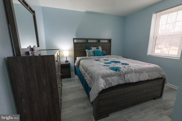 bedroom featuring light hardwood / wood-style flooring