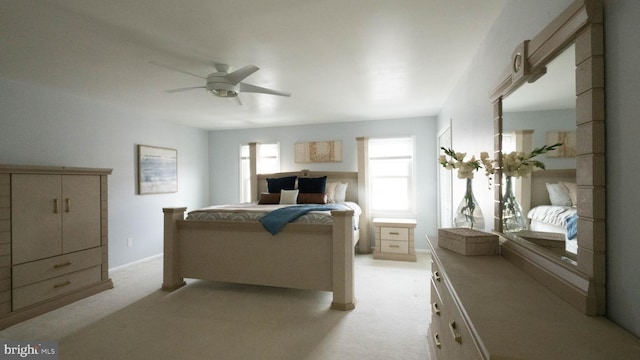 carpeted bedroom with ceiling fan