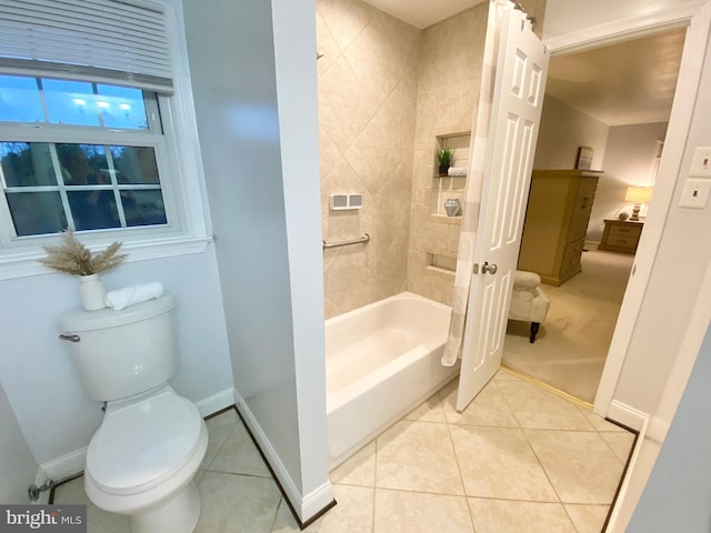 bathroom with shower / bath combination with curtain, toilet, and tile patterned floors