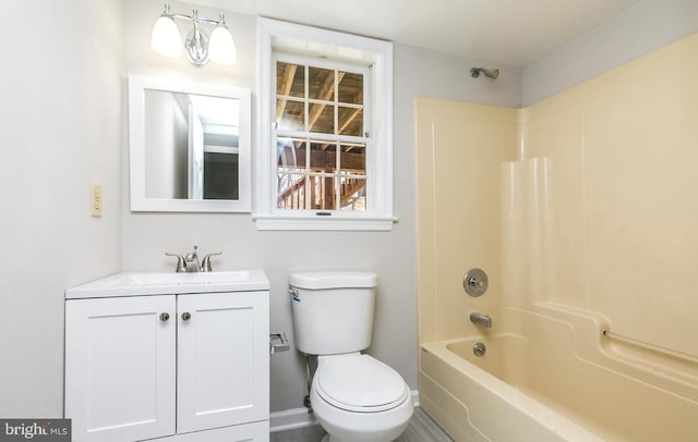 full bathroom with vanity, toilet, and shower / washtub combination