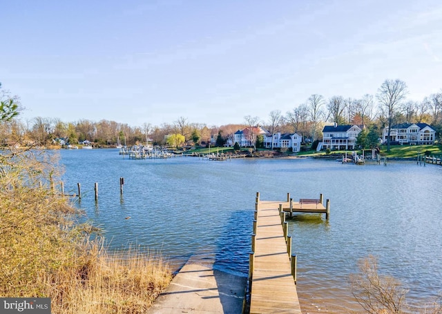 view of dock with a water view