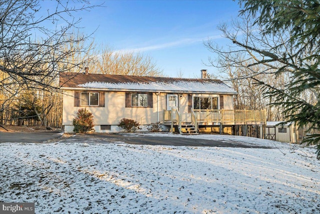 view of front of property with a deck