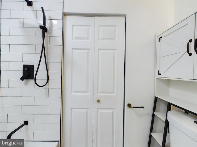 bathroom featuring toilet