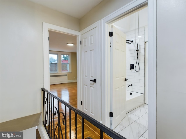 hallway featuring light hardwood / wood-style floors