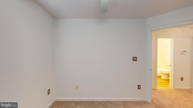 empty room with light colored carpet