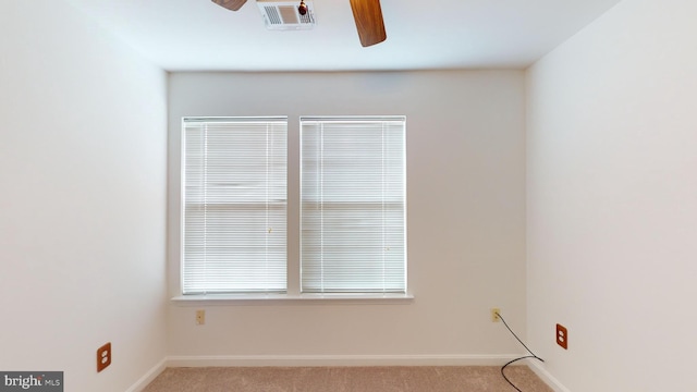 carpeted empty room with ceiling fan