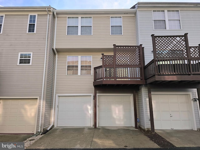 back of house featuring a balcony