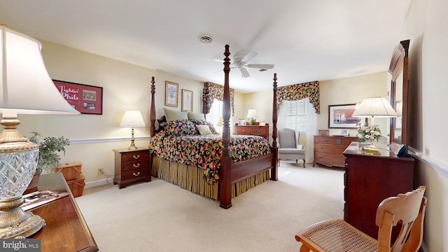 bedroom with light colored carpet and ceiling fan