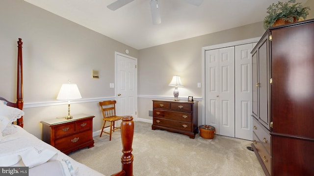 carpeted bedroom featuring ceiling fan