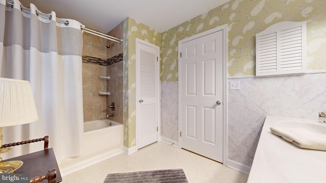 bathroom featuring shower / tub combo with curtain and vanity