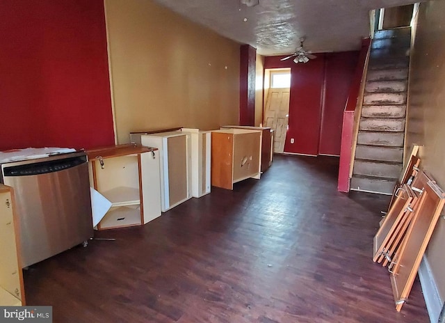 interior space featuring ceiling fan, dark hardwood / wood-style flooring, and stainless steel refrigerator