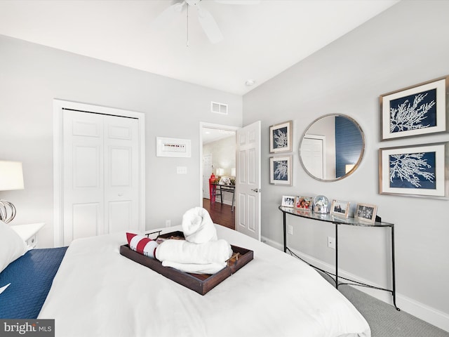 bedroom featuring carpet, a closet, and ceiling fan