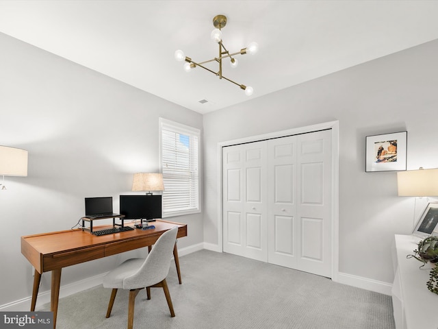 office area featuring a chandelier and light colored carpet