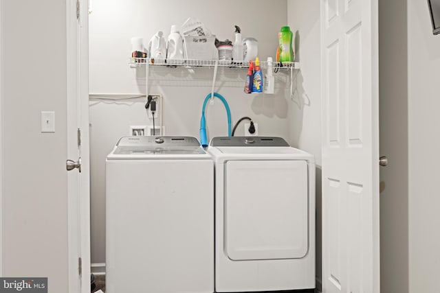 laundry area featuring separate washer and dryer