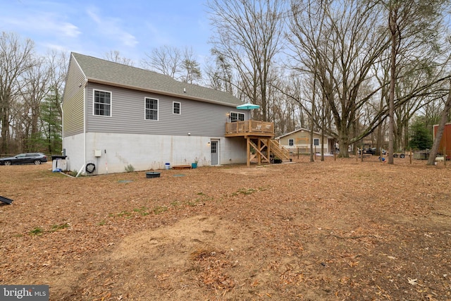 rear view of house with a deck