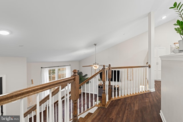 hall featuring hardwood / wood-style floors and lofted ceiling