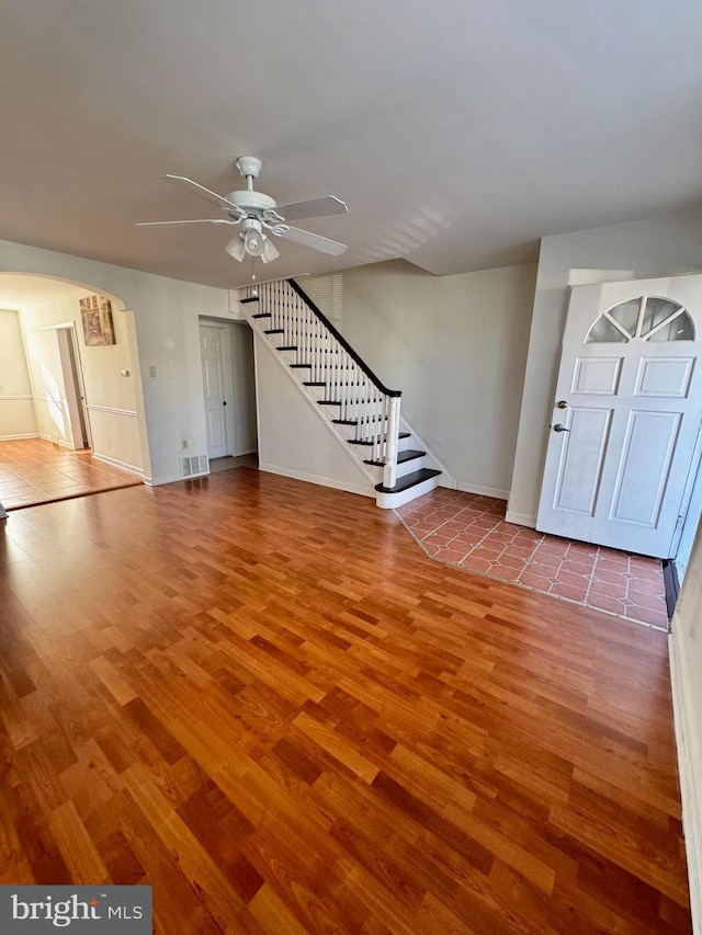 entryway featuring ceiling fan and hardwood / wood-style floors