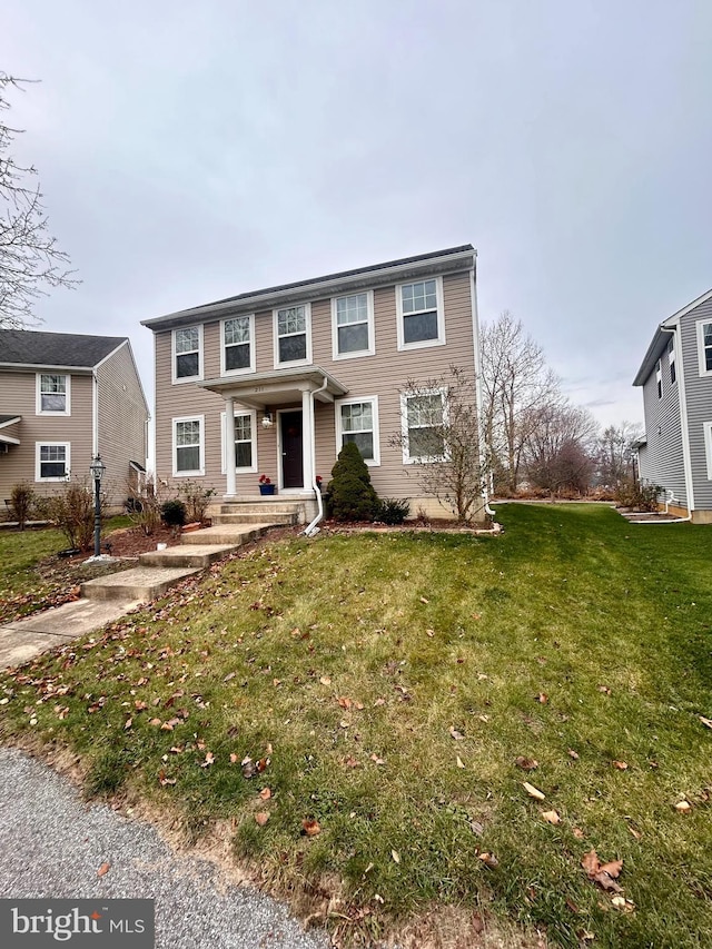 view of front facade with a front lawn