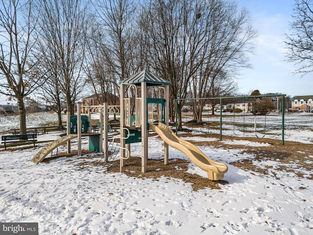 snow covered playground with playground community