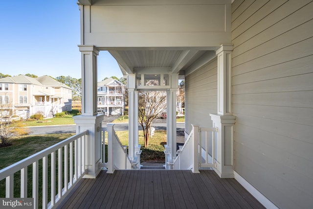 wooden terrace featuring a porch