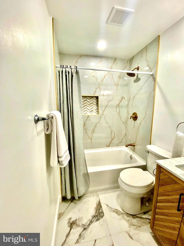 full bathroom featuring vanity, shower / tub combo, and toilet