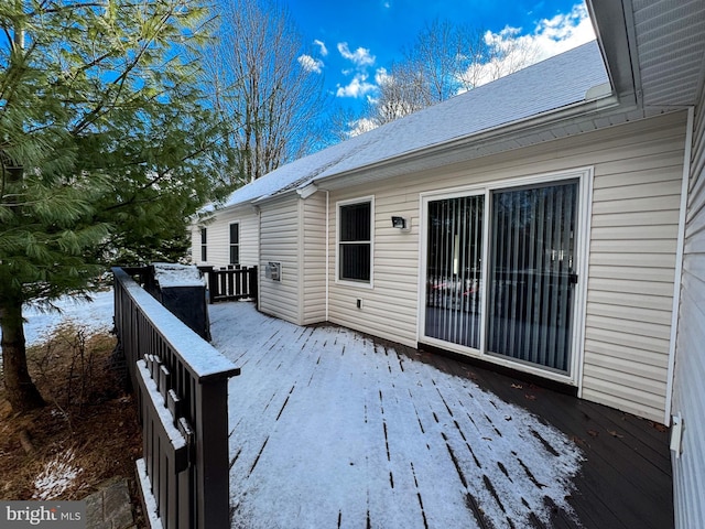 view of snow covered deck