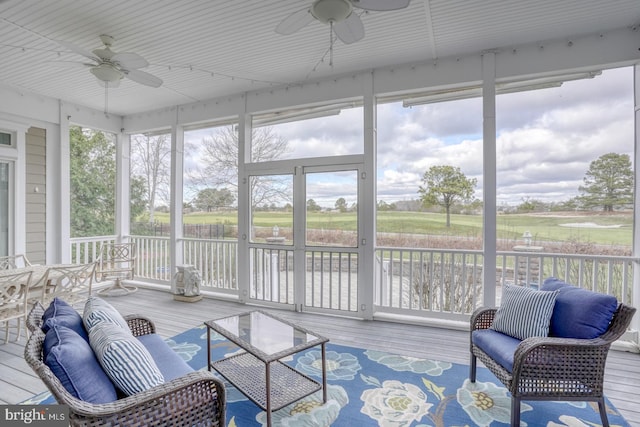 sunroom / solarium with ceiling fan